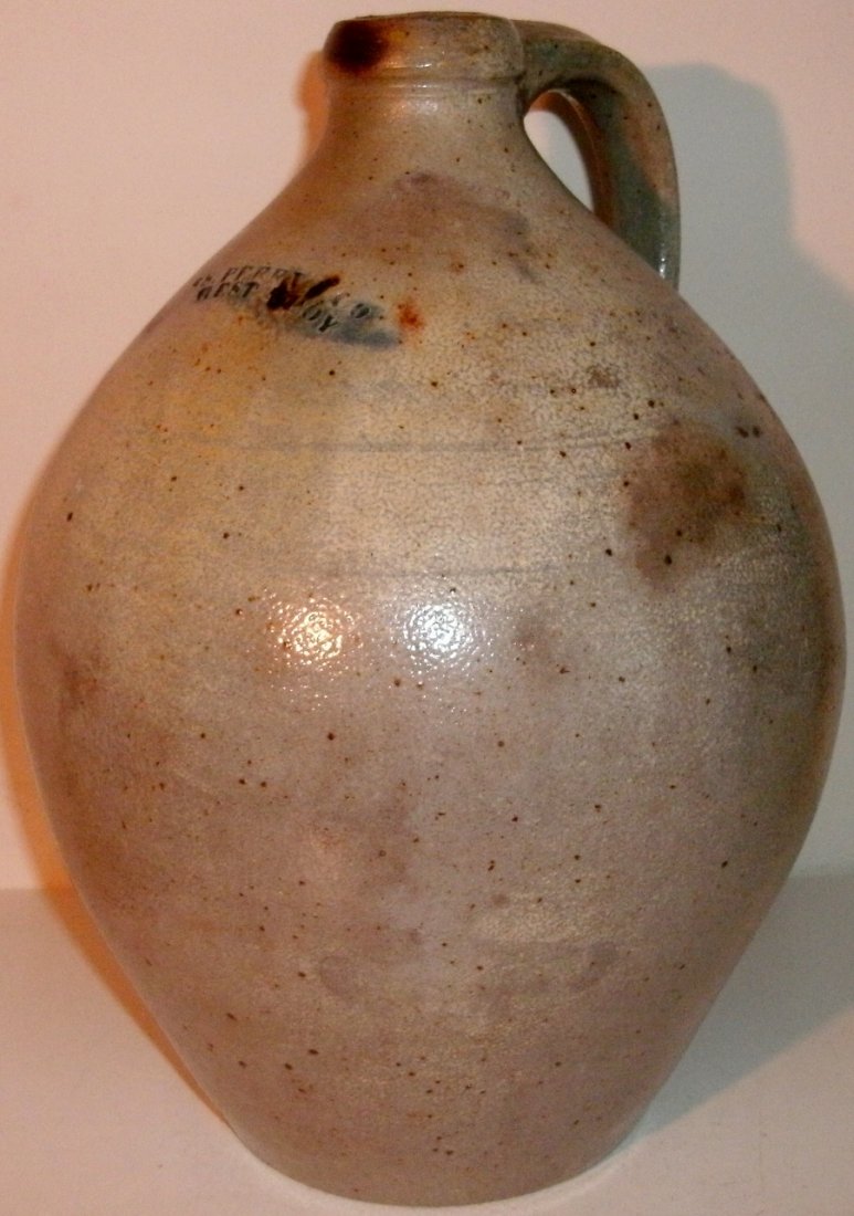 19th C 1 Gallon Ovoid Salt Glaze Stoneware Jug Perry NY: early 19th Century (Circa 1830-50) New York salt glaze stoneware 1 gallon ovoid jug.The jug has beautiful form / shape, with a "fluted" handle and is in excellent condition structurally....The jug has