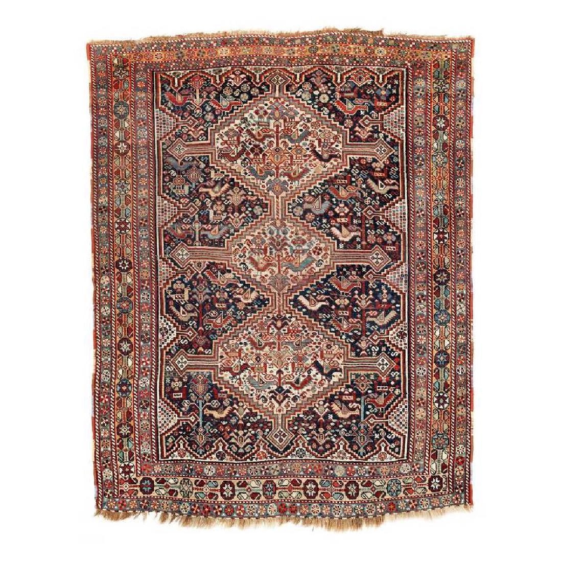 Khamseh: Late 19th century, 195 x 151 cm, South West Persia, Fars Three white hexagons with stepped outlines and lateral arms are aligned along the central axis, taking up the whole of the dark blue field. The