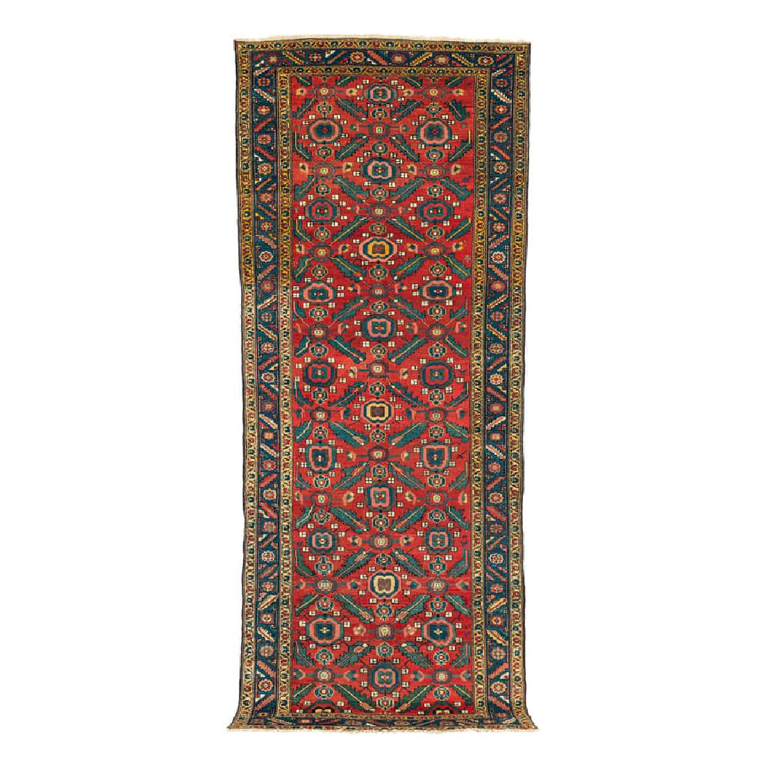 Bakhshaish Long Rug: Late 19th century, 350 x 140 cm, North West Persia, Azerbaijan This red-ground Bakhshaish displays a spaciously drawn mina khani repeat knotted onto white cotton warps. – Uniformly low pile, both en