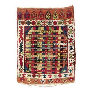 Konya Yastik: Mid 19th century, 88 x 64 cm, Central Anatolia This very rare Konya yastik displays a field design we have not encountered in any other yastik. A ground of narrow, multi-coloured vertical stripes is t