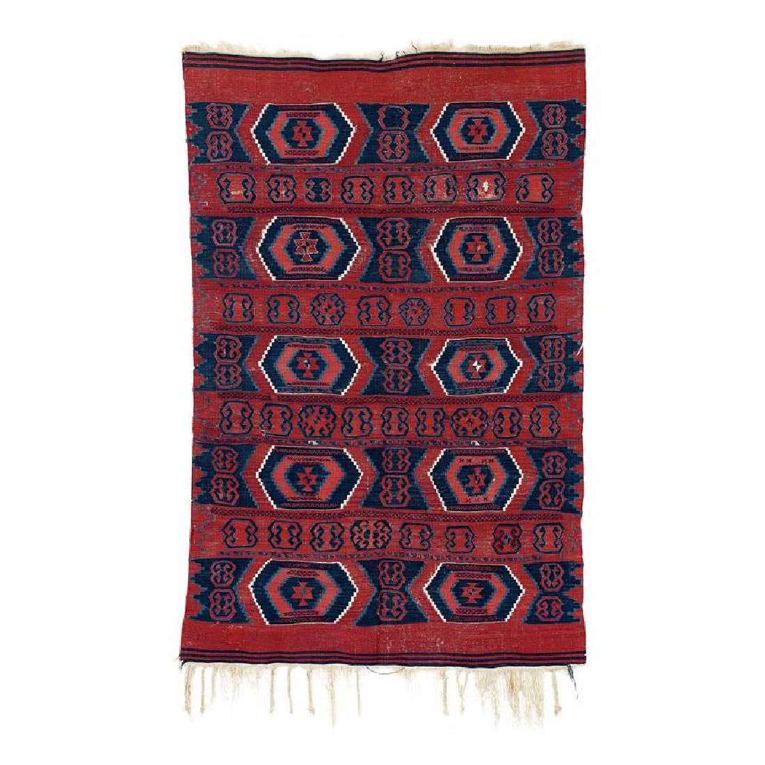 Yüncü Kilim: Mid 19th century, 225 x 148 cm, North West Anatolia, Balikesir region In this Yüncü kilim from the surroundings of Balikesir, the rare design of horizontal stripes is a striking feature. Only a very