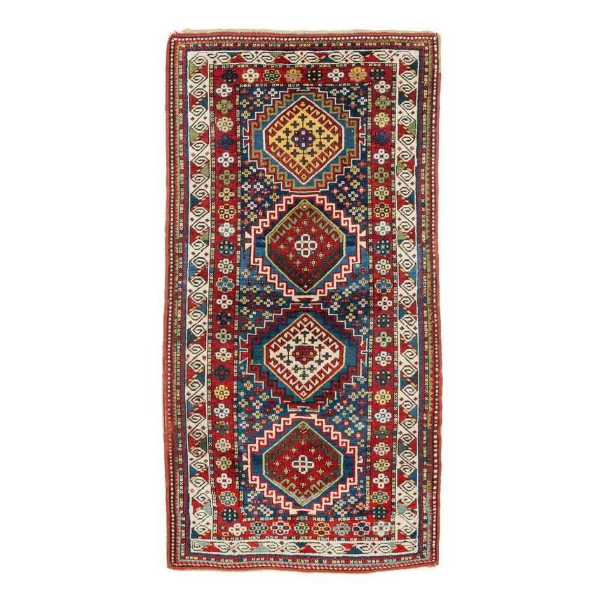 Kazak: Late 19th century, 198 x 103 cm, South West Caucasus Slight edge damage, pile with light signs of age and wear, both sides backed with Velcro.