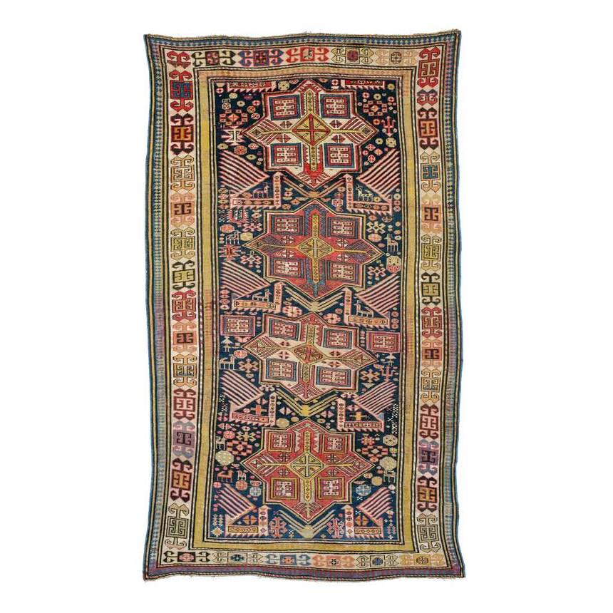 Akstafa: Late 19th century, 230 x 133 cm, East Caucasus, Shirvan region Original finishes, uniformly low pile, renewed lower right corner, some repiled areas and repairs, cut in the upper section and shortened