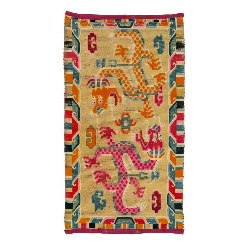 Khampa Dzong Kahden: First quarter 20th century, 149 x 84 cm, Central Aisa, South Tibet Signs of age and wear, low pile, ends edged with red fabric.