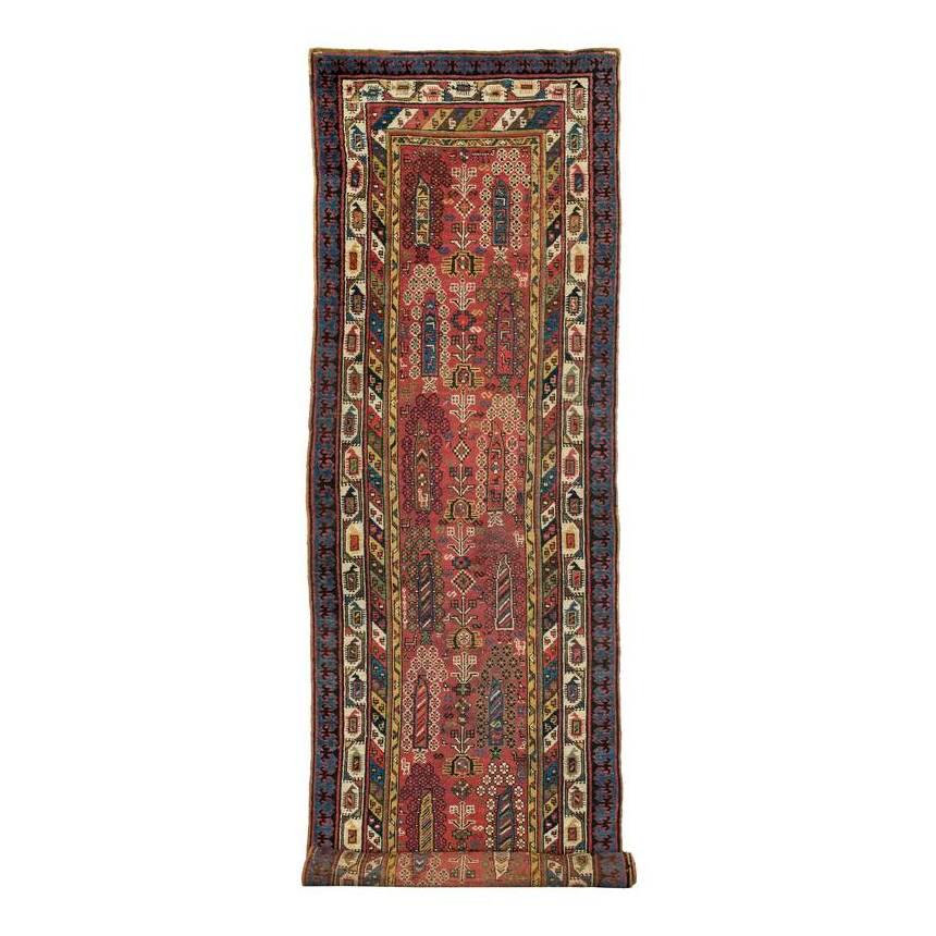 Bakhshaish Long Rug: Late 19th century, 416 x 101 cm, North West Persia, Azerbaijan Repiled upper and lower finishes, new overcasting along the sides, uniformly low pile, some repairs.