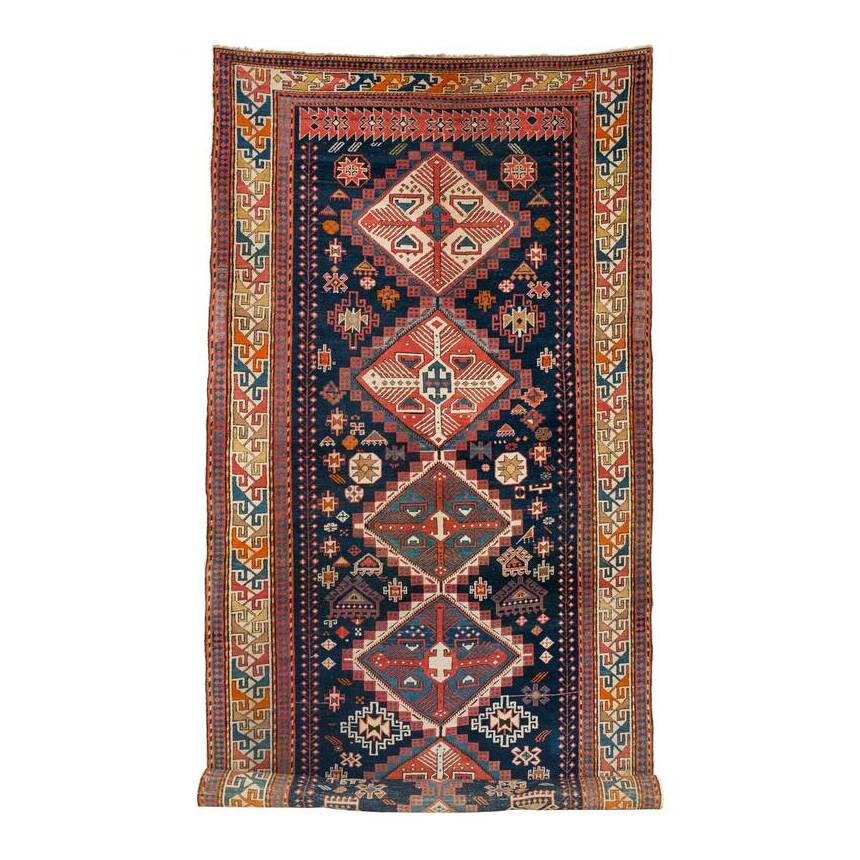 Shirvan: Late 19th century, 372 x 159 cm, East Caucasus Light signs of wear, some minor repairs, original selvedges, both ends minimally reduced. Overall good condition.