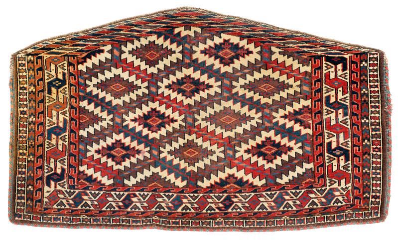 Yomut Asmalyk: Late 19th century, 65 x 111 cm, Central Asia, West Turkestan Slight signs of age and wear, heavily soiled, original finishes all around.