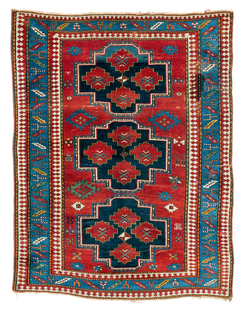 Kazak: Late 19th century, 232 x 180 cm, South West Caucasus Signs of age and wear, creases, one larger and several smaller restored areas, selvedges original, ends somewhat reduced. 