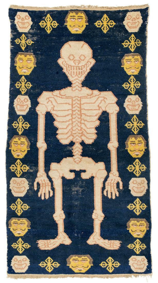 Tantric Khaden with Skeleton: 20th century, 171 x 94 cm, Central Asia, Northwest or West China, Gansu or Ningxia Signs of age and wear, pile very low in places, original finishes all around. 
