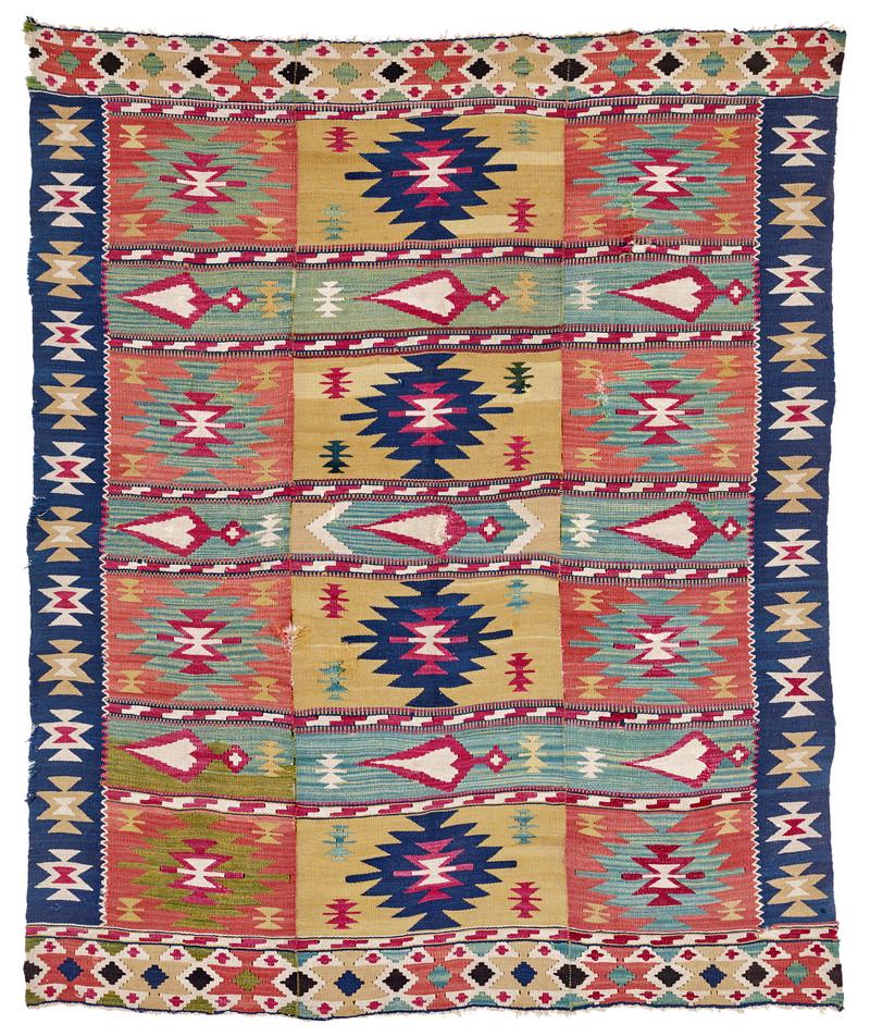 Ã‡al Kilim: second half 19th century, 224 x 185 cm, South West Anatolia, Denizli This rare kilim woven on a cotton warp probably originates from the Ã‡al area. It is made up of three narrow panels. The field d