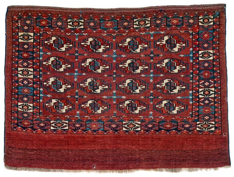 Yomut Chuval: mid 19th century, 80 x 111 cm, Central Asia, West Turkestan Signs of age and wear in the pile. Cut sides, replaced selvedges. Minor old repairs.