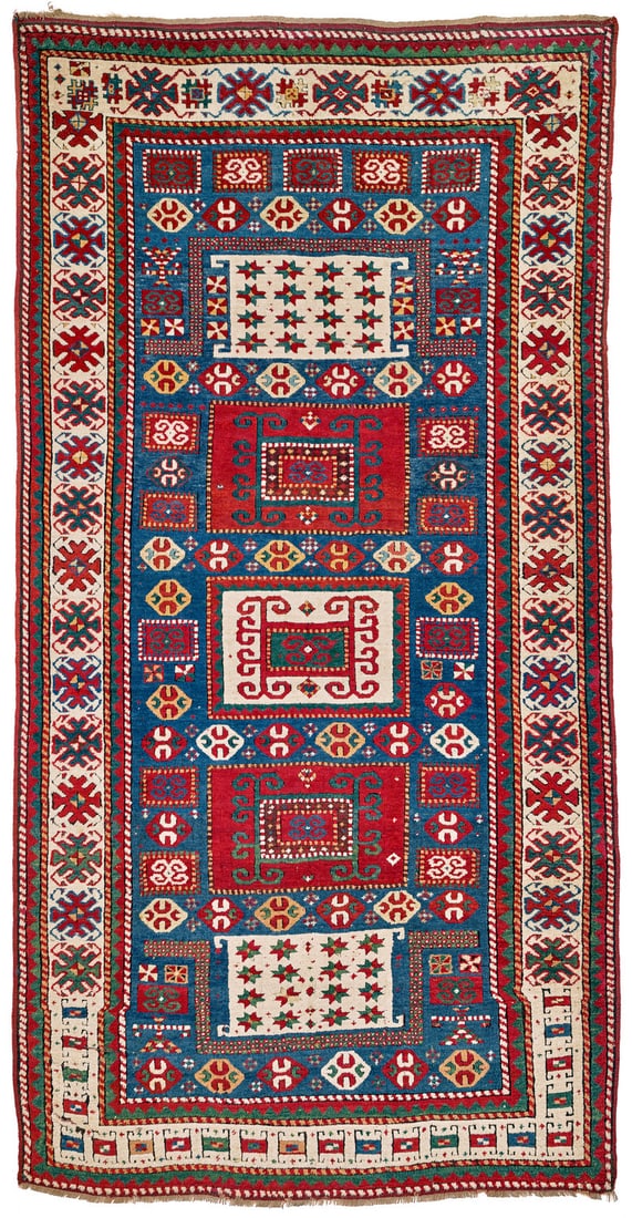 Karachoph Kazak: mid 19th century, 281 x 142 cm, South West Kaukasus Blue-ground specimens with a double-niche pattern are rare.