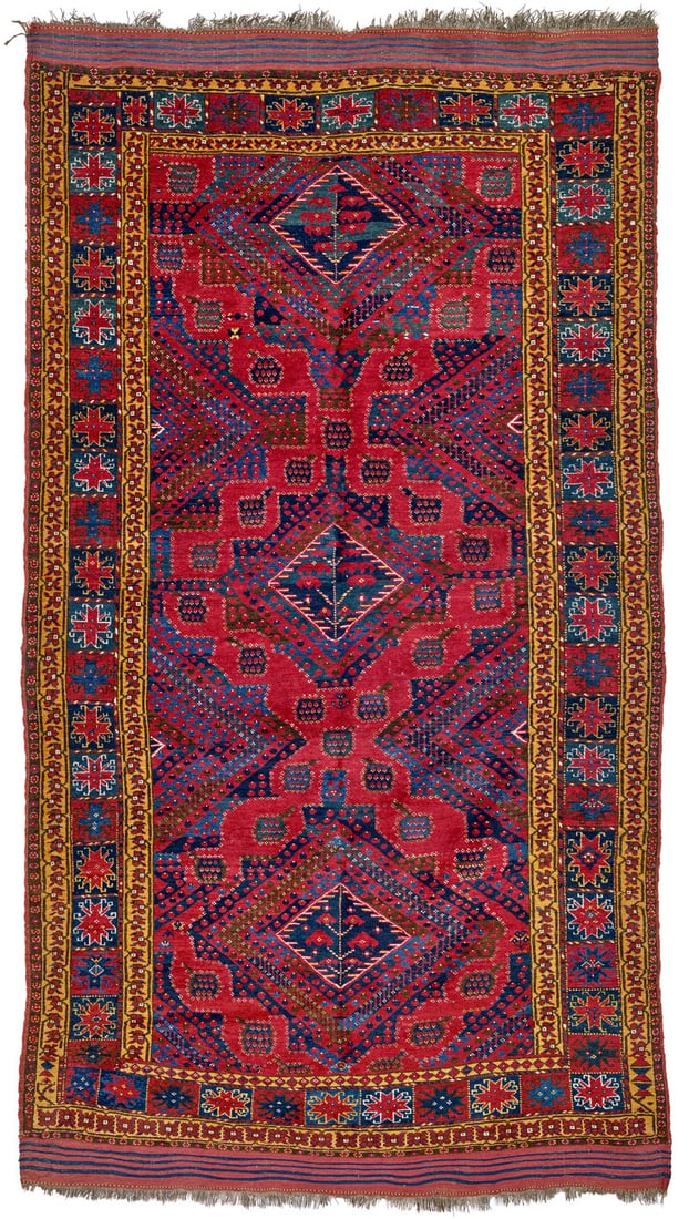 Beshir: second half 19th century, 286 x 164 cm, Central Asia, middle Amu Darya valley Three large nested diamonds with a small tree at their centres form the vertical central axis in the field of this