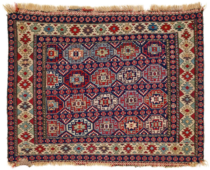 Shahsavan Bag Face: first half 19th century, 46 x 62 cm, North West Persia, Azerbaijan A very finely woven sumakh bag face by the Khamseh Shahsavan. The rare field design consists of 20 small Memling guls arranged in