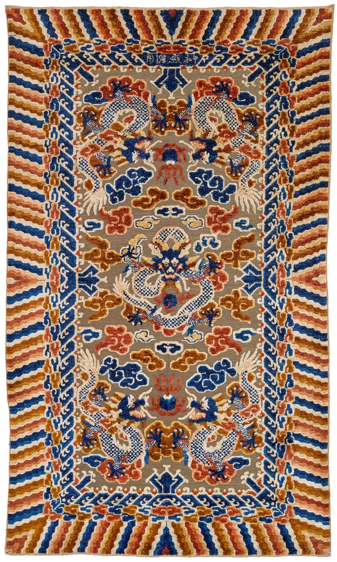 Ningxia Silk Rug: late 19th century, 223 x 130 cm, West China A Chinese pictorial rug with a silk pile and a field ground brocaded in metal-wrapped threads (brass wire on cotton yarn). The centre of the composition is