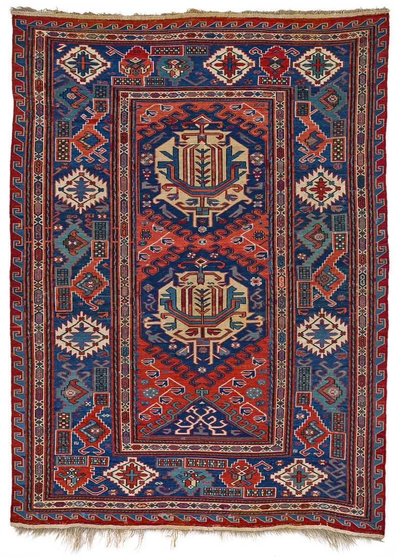 Lesghi Sumakh: second half 19th century, 191 x 140 cm, North East Caucasus, Daghestan The large-scale style of drawing and the ornamentation suggest that this sumakh belongs to the Lesghi group. In the narrow red