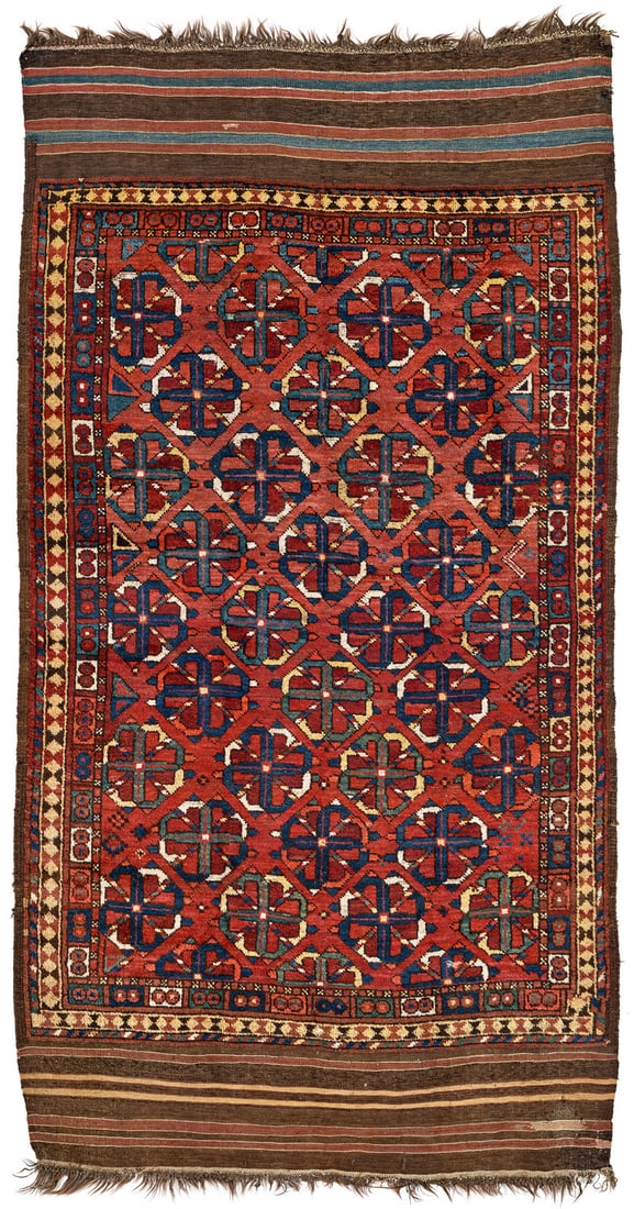 Ersari: late 19th century, 254 x 140 cm, Central Asia, middle Amu Darya valley The red field shows a repeat of large rosettes placed in offset rows. A very narrow two-band border, long kilim finishes with