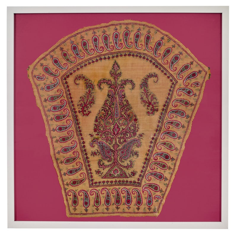 Kerman Embroidery: 19th century, 55 x 53 cm, South Persia This trapezoid textile with a rounded top is a section of a garment. Fine embroideries in wool yarn on a wool foundation were a specialty of the Kerman