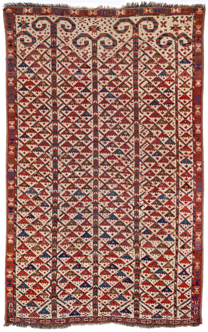 Ersari Prayer Rug: second half 19th century, 194 x 121 cm, Central Asia, middle Amu Darya valley A very rare Ersari prayer rug. The white field shows four complete trees of life whose tips are curled double hooks. A