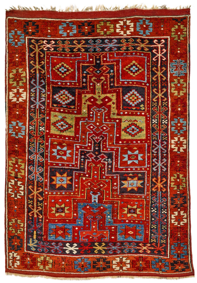 Karapinar Niche Carpet: first half 19th century, 165 x 117 cm, Central Anatolia, Konya Niche carpets of this rare group were made in Karapinar. Their ascending design of stepped interlocking gables crowned with double hooks