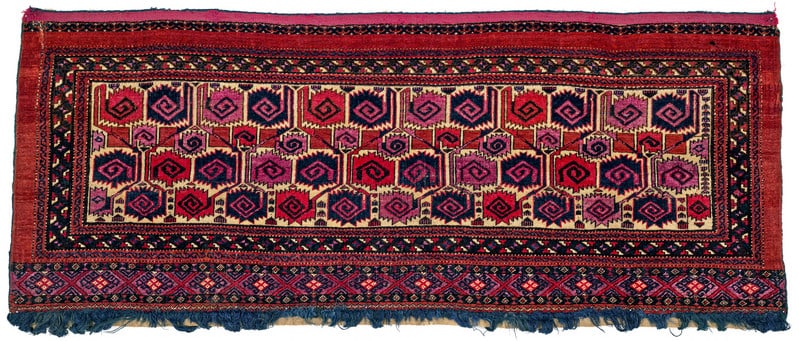Salor Torba: first half 19th century, 50 x 128 cm, Central Asia, West Turkestan The white field of this Salor torba is covered in three horizontal rows of offset, serrated curled leaves in steel blue, madder red