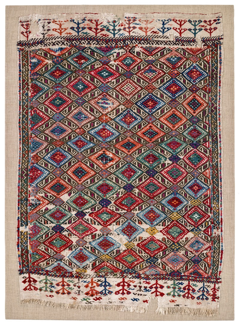 Yoruk Storage Bag: late 19th century, 100 x 72 cm, Central Anatolia The face of a white-ground storage bag with a diamond design in the brocading technique.
