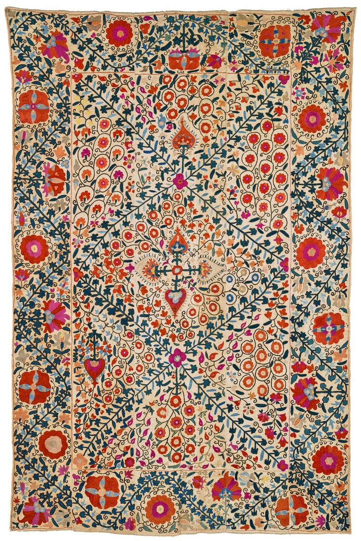 Kermina Suzani: first half 19th century, 241 x 161 cm, Central Asia, South West Uzbekistan This Kermina suzani composed of six panels displays a rare field design. Long diagonal stems divide the surface into
