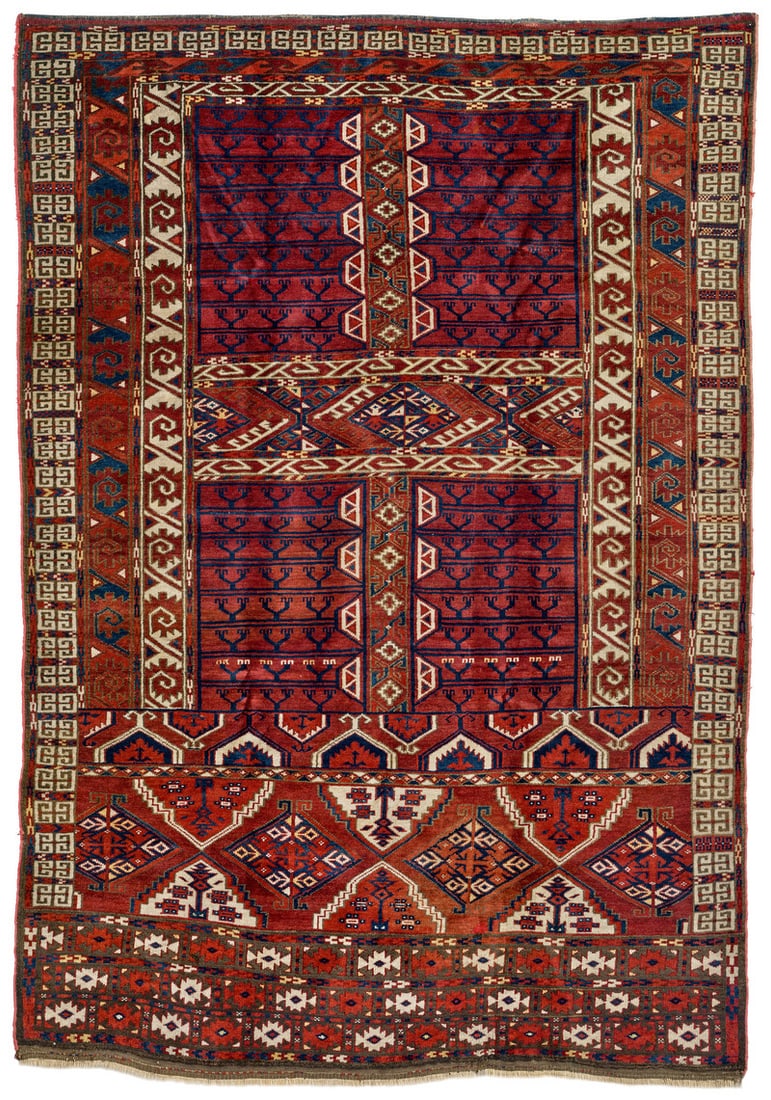 Kizil Ayak Ensi: mid 19th century, 175 x 121 cm, Central Asia, West Turkestan, Pendeh A rare Kizil Ayak ensi woven in a design that shows strong influences from other tribes. The outer border of bracket motifs and