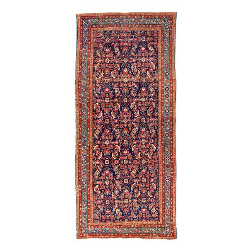 Bakhshaish Kelleh: Second half 19th century, 320 x 143 cm, North West Persia, AzerbaijanThe Bakhshaish provenance is usually associated with large-format rugs of open design that are reminiscent of Heriz carpets and con
