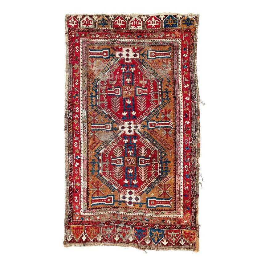 Ladik: Mid 19th century, 128 x 92 cm, Central Anatolia The ochre field is almost completely filled by two large red-ground octagons with a cruciform interior drawing and hooked outlines pointing both inwards