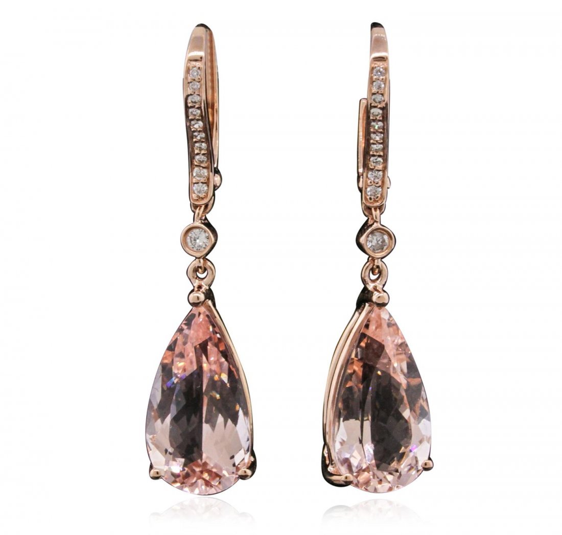 14KT Rose Gold 9.65ctw Morganite and Diamond Earrings: One pair of earrings featuring: 14KT rose gold weighing 9.65 grams containing two morganites with a total weight of 9.65cts and 22 round cut diamonds with a total weight of 0.18cts.
