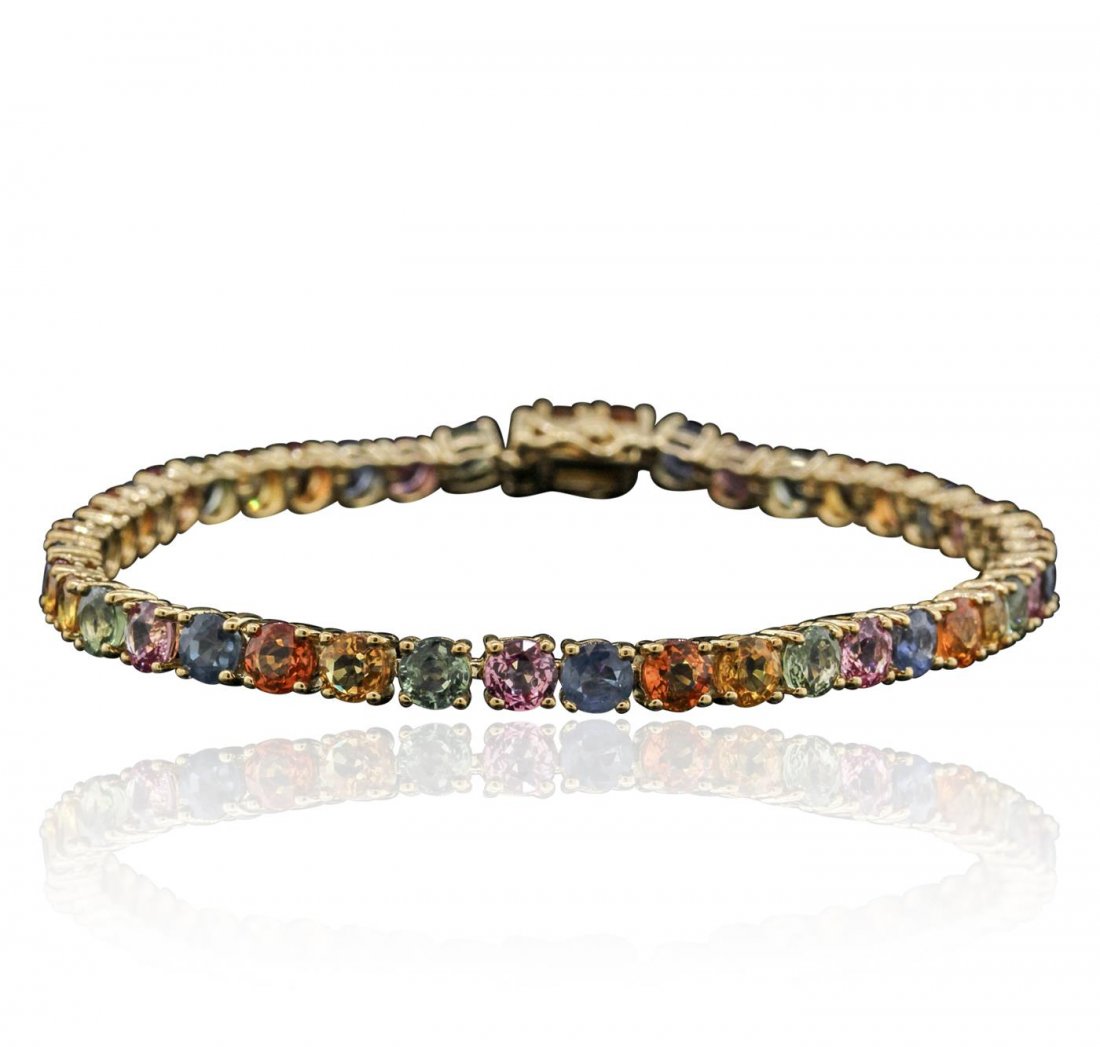 10KT Yellow Gold 15.62 ctw Multi Gemstone Bracelet: One bracelet featuring: 10KT yellow gold weighing 6.93 grams containing 45 multi colored gemstones with a total weight of 15.62cts.