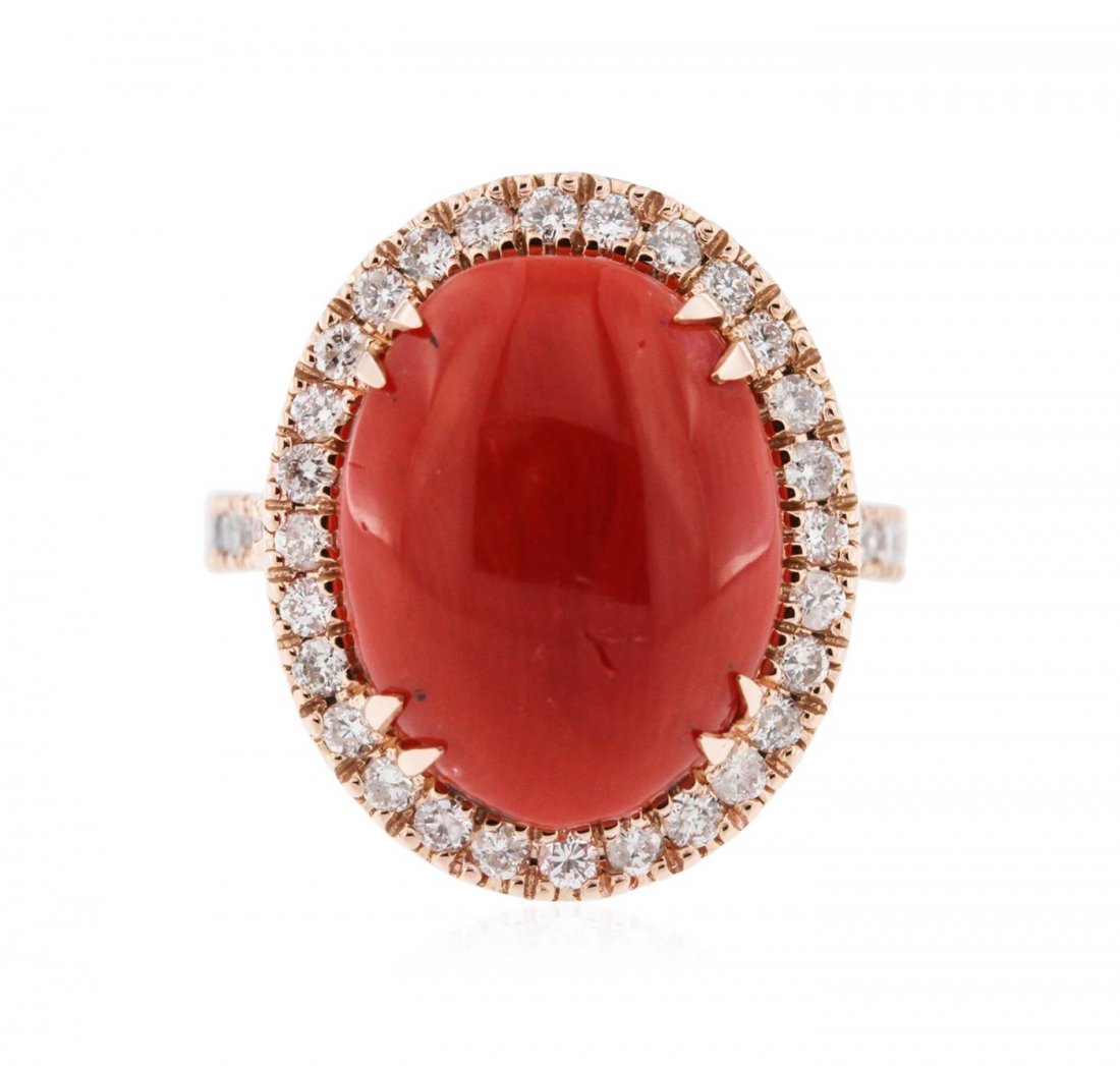 14KT Rose Gold 10.94 ctw Coral and Diamond Ring: One electronically tested 14KT rose gold ladies cast coral and diamond ring with a bright polish finish. Identified with markings of "14K". Condition is new. Containing: One prong set oval cabochon cu