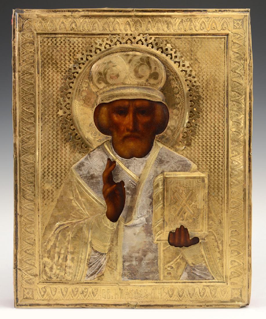 Russian Icon of St. Nicholas, Moscow, 1908-1917, with a: Russian Icon of St. Nicholas, Moscow, 1908-1917, with a gilt silver oklad, with a maker's mark of "AC" in Cyrillic, H.- 8 3/4 in., W.- 7 in.