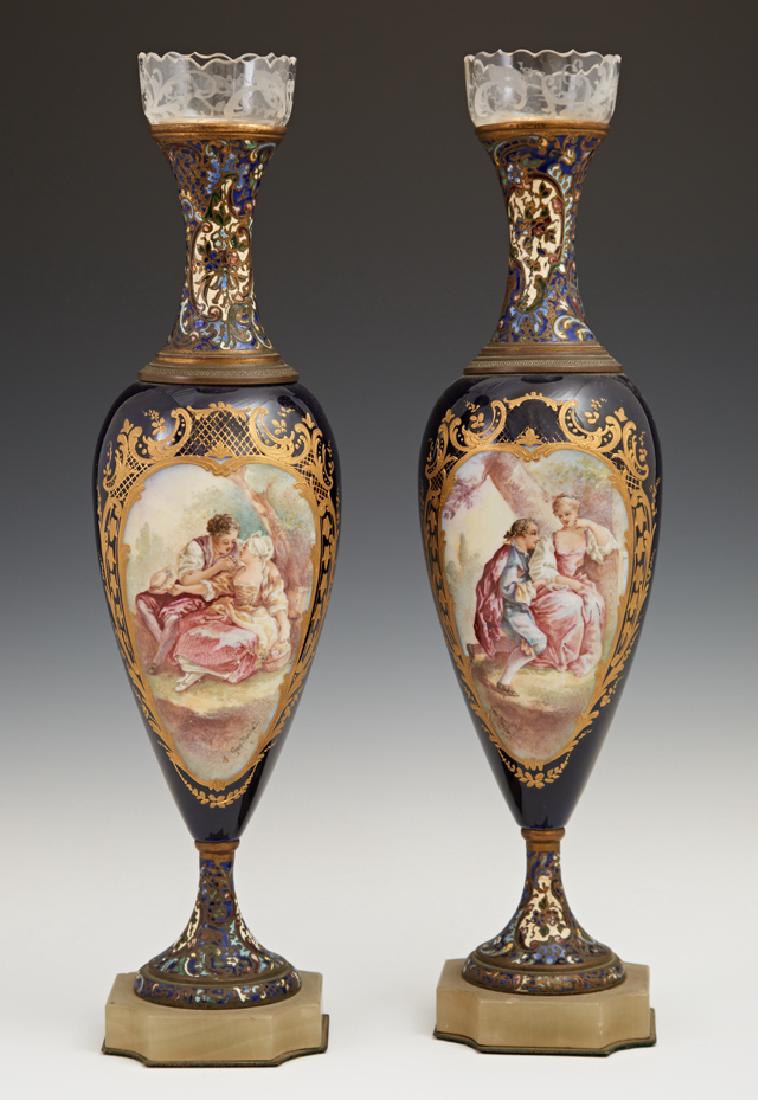 Pair of French Brass and Champleve Cobalt Baluster: Pair of French Brass and Champleve Cobalt Baluster Porcelain Vases, late 19th c., with gilt decoration and reserves of lovers in gardens, signed Geo. Roche, on one side and landscape reserves on the o