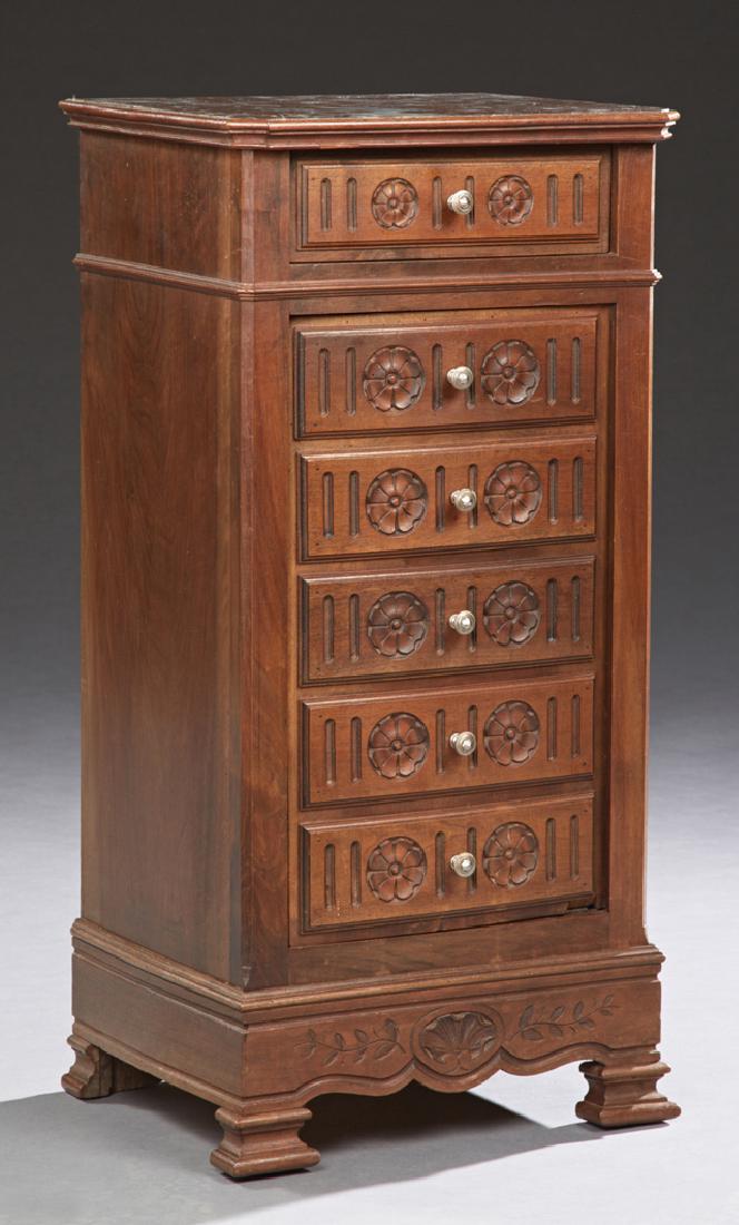 French Henri II Style Carved Walnut Marble Top: French Henri II Style Carved Walnut Marble Top Nightstand, late 19th c., the inset highly figured rouge marble over a frieze drawer above a five faux drawer cupboard door on a plinth base with ogee bl