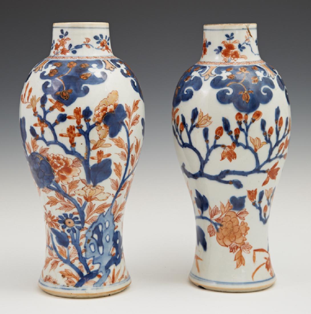 Pair of Imari Baluster Vases, 19th c., with floral: Pair of Imari Baluster Vases, 19th c., with floral decoration in the typical palette of blue, orange, and white, H.- 9 1/2 in., Dia.- 4 1/4 in. Provenance: The Estate of Sidney J. Mazarat III, New Orl