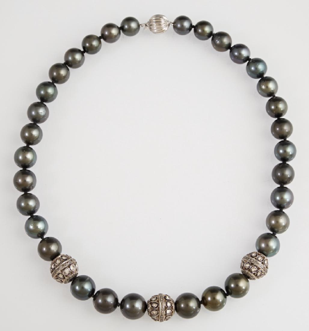 Graduated Strand of Thirty-Two Tahitian Black Cultured (1 of 2)