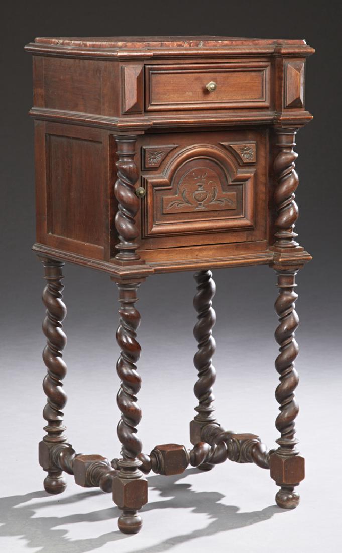 French Louis XIII Style Carved Walnut Marble Top: French Louis XIII Style Carved Walnut Marble Top Nightstand, 19th c., the inset highly figured rouge marble over a frieze drawer above a cupboard door, flanked by rope twist supports to rope twist leg