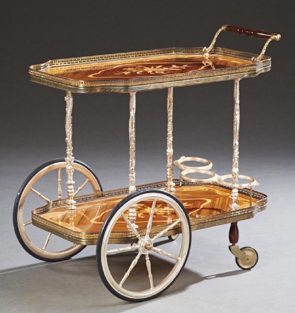 Louis XV style Marquetry Inlaid Two Tier Cherry an: Louis XV style Marquetry Inlaid Two Tier Cherry and Bronze Dessert Trolley, 20th c., the shaped brass galleried upper level with a handle, on brass supports to a like lower tier with three bottle rack
