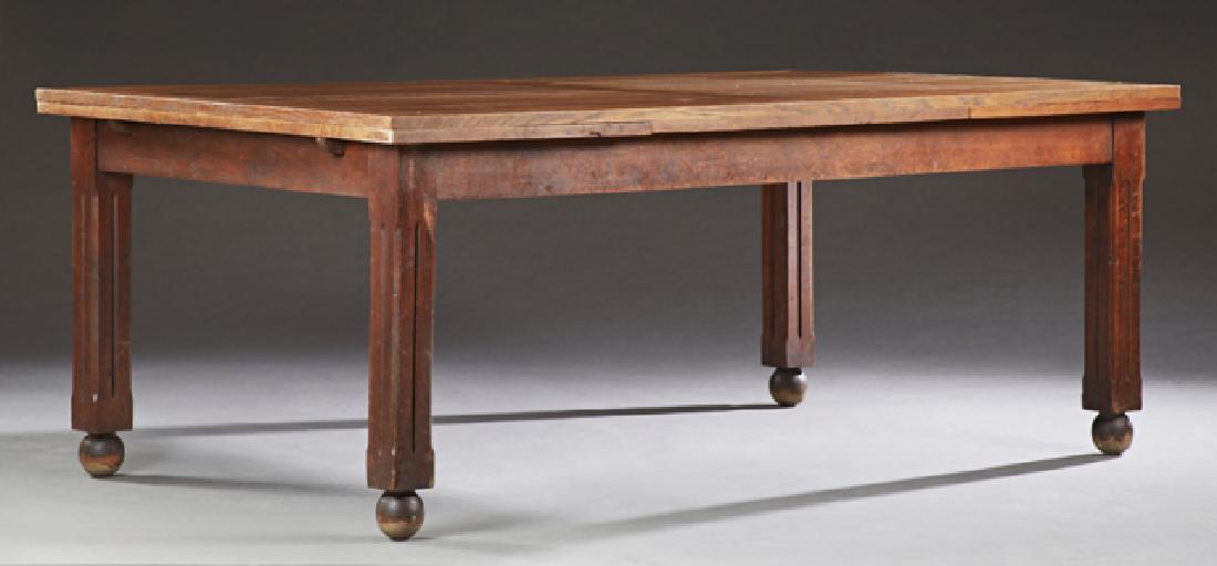 French Provinical Carved Oak Drawleaf Dining Table,: French Provincial Carved Oak Drawleaf Dining Table, 20th c., the rectangular top over chamfered incised block legs, on ball feet, H- 30 1/8 in., W- Closed- 79 in., Open- 125 3/4 in., D- 47 1/8 in.