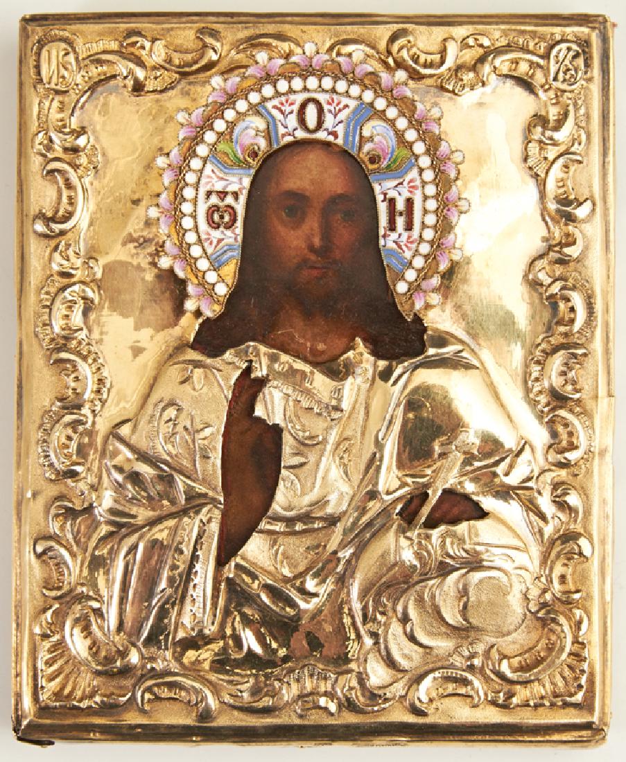 Russian Icon of Christ, 1848, Moscow, with a gilt: Russian Icon of Christ, 1848, Moscow, with a gilt silver and enamel oklad, with a maker's mark of AO, presented in a burled wood kiot, H.- 5 3/8 in., W.- 4 3/8 in.