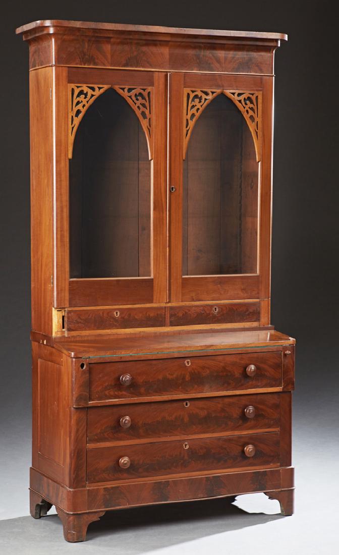 American Carved Mahogany Secretary Bookcase, 19th c.,: American Carved Mahogany Secretary Bookcase, 19th c., the stepped rounded corner ogee crown over double arched glazed doors, above two frieze drawers over a fall front opening to a green baize lined w