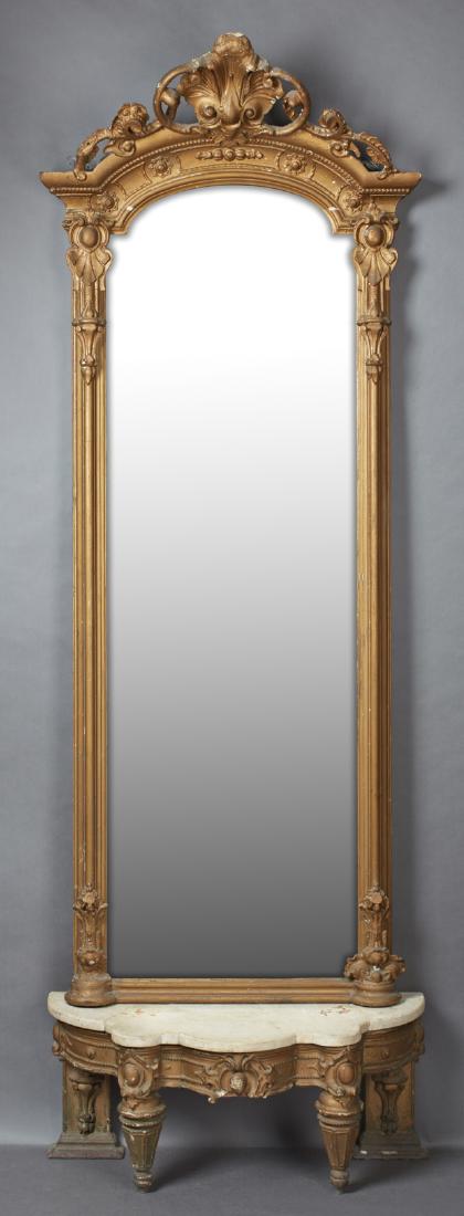 American Victorian Gilt and Gesso Pier Mirror and: American Victorian Gilt and Gesso Pier Mirror and Marble Top Console, 19th c., probably New Orleans, with a pierce carved crest over the arched crown atop relief stiles with anthemion and oval medalli