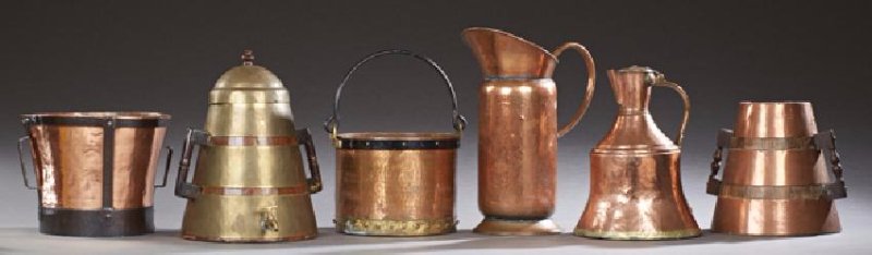 Six Pieces of French Copper, late 19th., consisting of: Six Pieces of French Copper, late 19th., consisting of a hammered bucket with brass and iron banding and a folding iron handle, two large copper pitchers, a brass and oak water dispenser, a copper oak