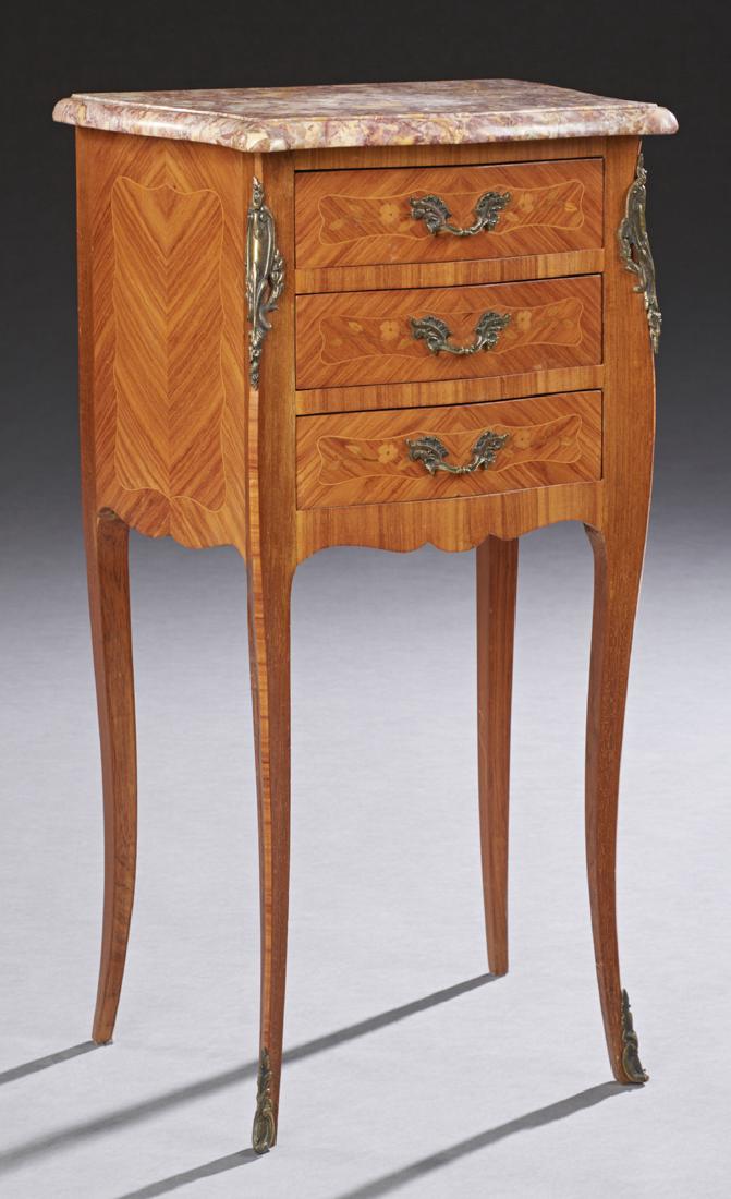 French Louis XV Style Marquetry Inlaid Ormolu: French Louis XV Style Marquetry Inlaid Ormolu Mounted Carved Walnut Bombe Marble Top Night Stand, early 20th c., the rounded edge ocher and violette Breche d' Aleps marble over two bowed frieze drawer