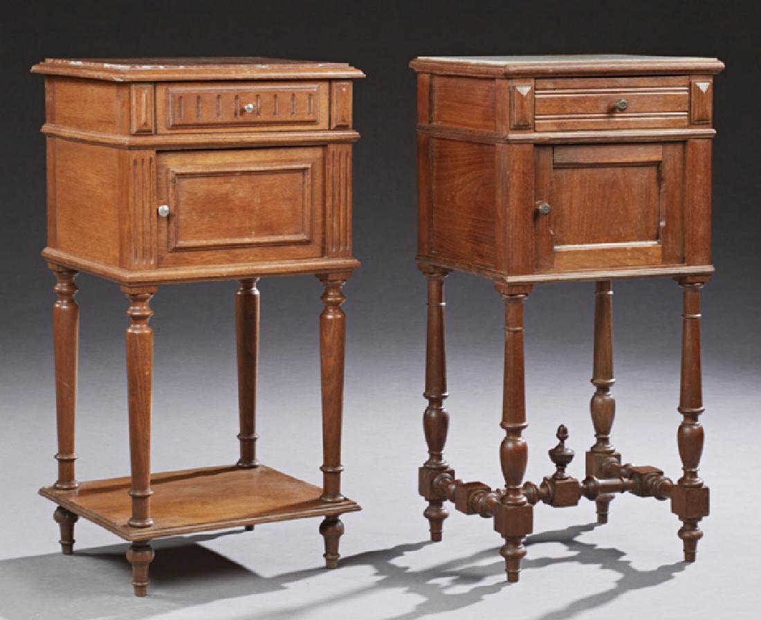 Two French Henri II Style Carved Walnut Marble Top: Two French Henri II Style Carved Walnut Marble Top Nightstands, 20th c., one with an inset figured rouge marble over a frieze drawer and a pot cupboard on turned tapered legs to a lower shelf. The sec