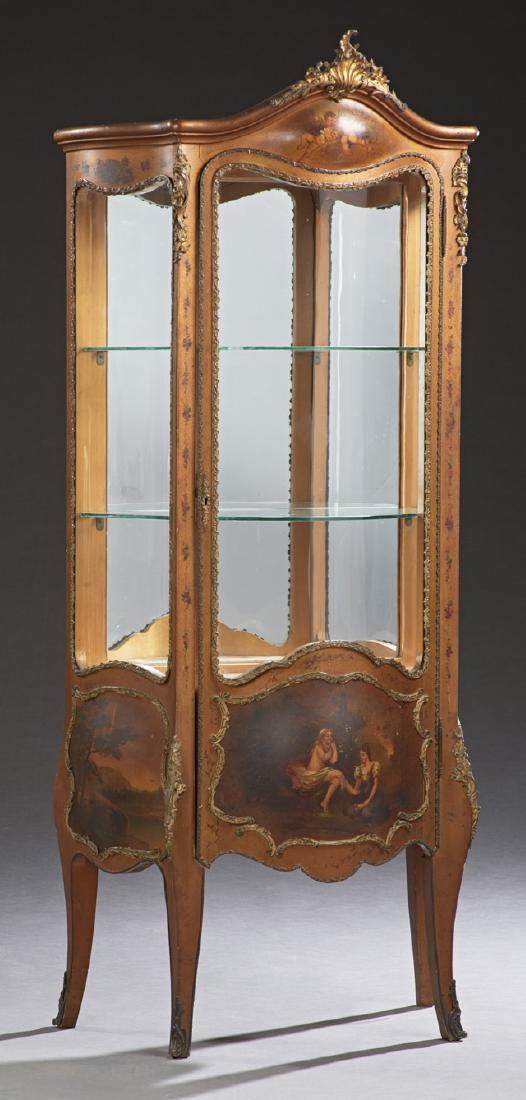 French Vernis Martin Ormolu Mounted Curved Glass: French Vernis Martin Ormolu Mounted Curved Glass Bombe Curio Cabinet, early 20th c., the arched crown over a curved glass door and sides with lower bombe scenic painted panels, on cabriole legs with o
