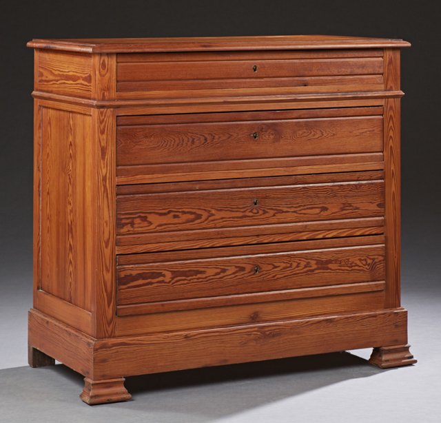 French Provincial Pitch Pine Commode, late 19th: French Provincial Pitch Pine Commode, late 19th c., the rounded edge top over a reeded frieze drawer above three deep reeded drawers, on stepped block feet, matching the previous lot, H.- 39 in., W.- 