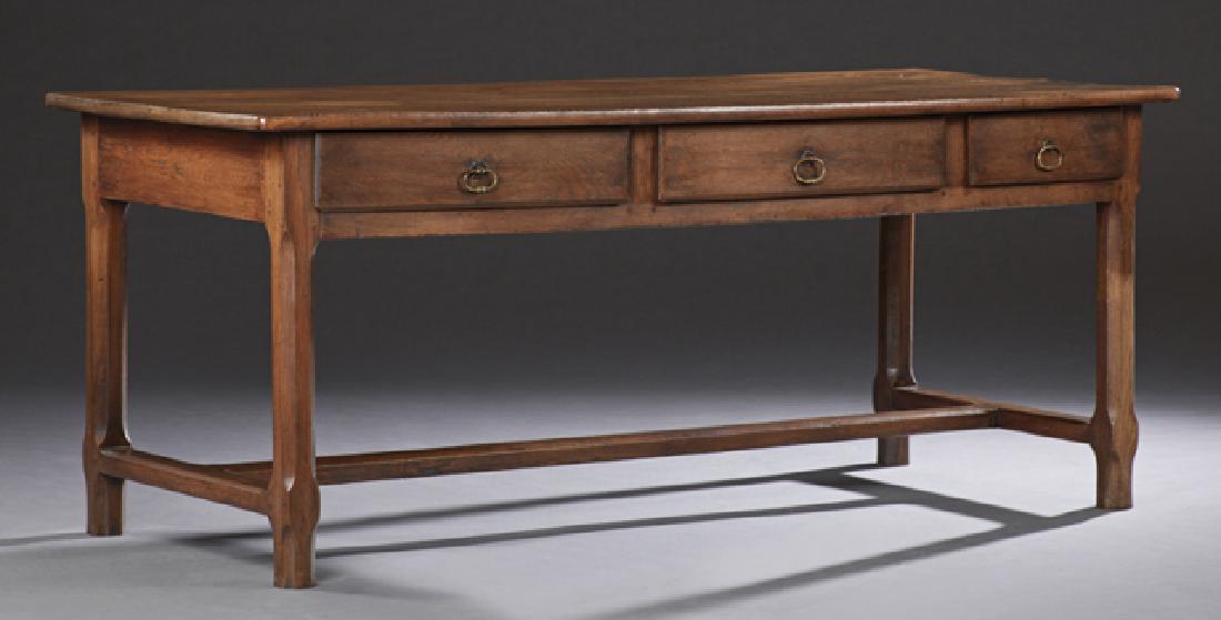 French Provincial Carved Walnut Farmhouse Table,: French Provincial Carved Walnut Farmhouse Table, 19th c., the rectangular rounded corner top over a wide skirt with three frieze drawers, on chamfered legs joined by an H-form stretcher, H.- 29 1/2 in
